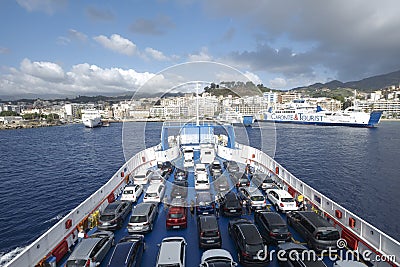 On the ferry with cars and camper vans to Sicily crossing Straits of Messina, Italy, Sicily Editorial Stock Photo