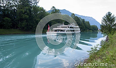 Ferry cruising on a river Stock Photo