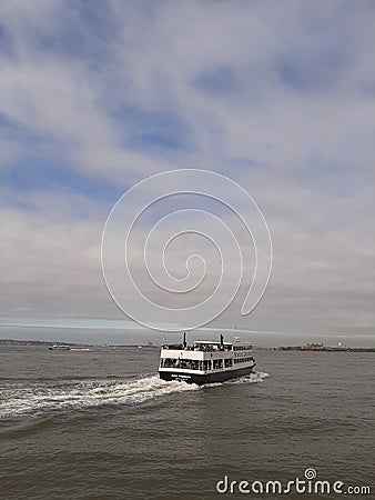 Ferry going to Liberty Island, NYC Editorial Stock Photo