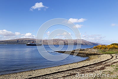 Ferry leaving craignure port in mull at the end of the day Editorial Stock Photo