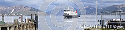 Ferry ship arriving at Scottish island of Rothersay Editorial Stock Photo