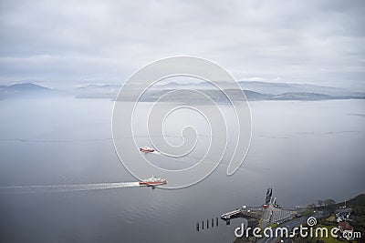 Ferry ship crossing on open vast ocean cruise journey aerial view from above during atmospheric weather sea island trip Scotland U Stock Photo