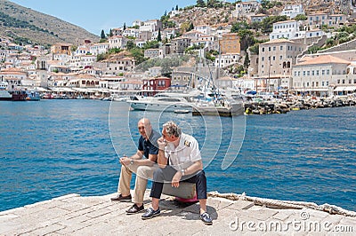 Ferry staff at Greek island Hydra Editorial Stock Photo