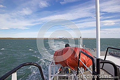 Ferry in the Strait of Magellan with Primera Angostura in the background, Chile Stock Photo