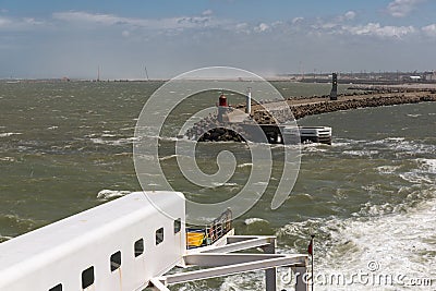 Ferry to Engeland leaving French harbor of Calais Stock Photo