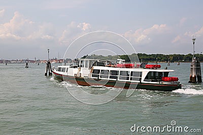 Ferry transports tourists from the Venice Lido to Venice Stock Photo