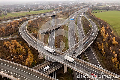 Aerial view of a complex motorway road layout in the UK countryside Editorial Stock Photo