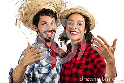 Festa Junina: party in Brazil. Brazilian couple wearing plaid sh Stock Photo