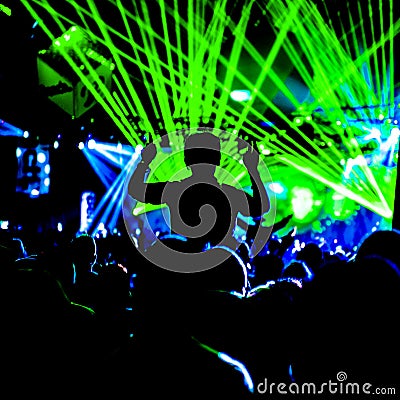 Festival Crowd Girl With Hands Up Lazers Stock Photo