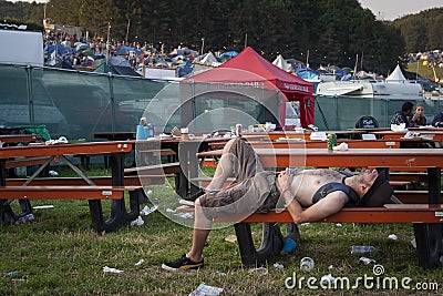 Festival goer struggling at Boomtown Editorial Stock Photo