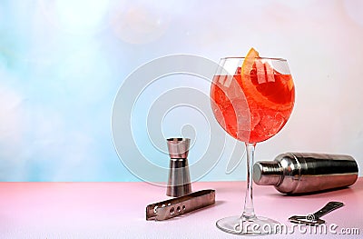 Festive alcoholic cocktail Aperol spritz in glasses on a bright background, concept for bar and New Year's Eve, alcoholic Stock Photo