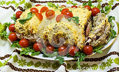 Festive baked meat in one piece on a plate Stock Photo