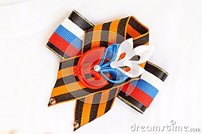 Festive brooch with a St.George's Ribbon Stock Photo