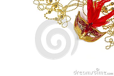 Festive Carnival background with red mask, beads and copy space Stock Photo