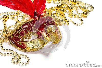 Festive Carnival background with red mask, beads and copy space Stock Photo