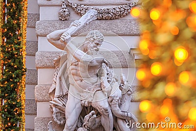 Festive cityscape - view of the sculpture of Hercules with the Lernaean Hydra on the St. Michael`s Wing of the Hofburg Stock Photo
