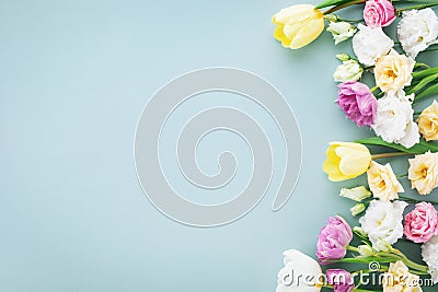 Festive composition for Happy mothers day. Spring colorful flowers on pastel blue background Stock Photo