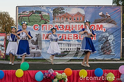 Festive concert of Amateur ensembles in honor of the village in Iznoskovsky district, Kaluga region of Russia. Editorial Stock Photo