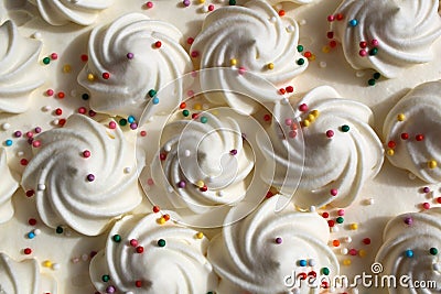 Festive curls for white cream cake with multicolored sprinkles Stock Photo