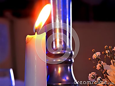 Festive decoration with lighted candle Stock Photo