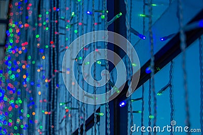 Festive decoration of office buildings, lights electric garland with lights Stock Photo