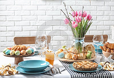 Festive Easter table setting with traditional meal Stock Photo