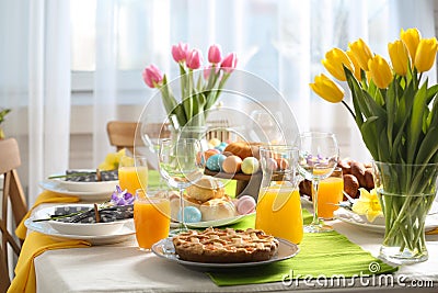 Festive Easter table setting with traditional meal Stock Photo