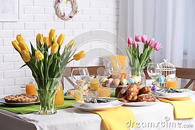 Festive Easter table setting with traditional meal Stock Photo