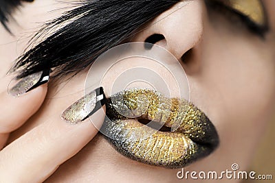 Festive fashion black gold make up and French manicure Stock Photo