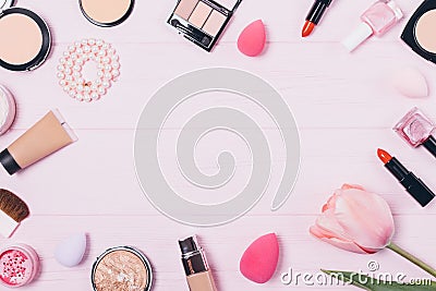 Festive flat layout of decorative feminine cosmetics Stock Photo