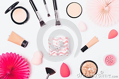 Festive flat layout of makeup products and gift box Stock Photo