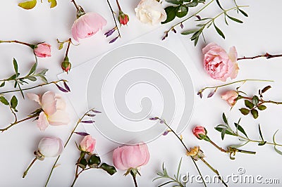 Festive flower composition on the white wooden background. Overhead view Stock Photo