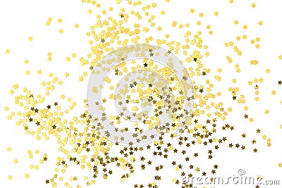 Festive golden stars of confetti on a white background. Group of gold star decoration object design. Stock Photo