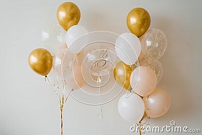 Festive helium balloons in gold and white for the 30th anniversary Stock Photo