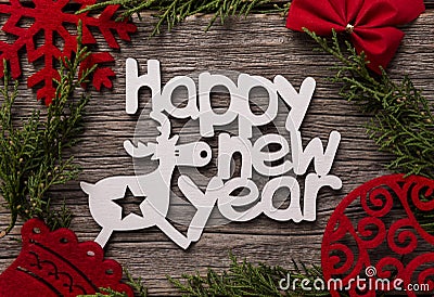 Festive inscription Happy New Year. Composition on a wooden background. Stock Photo