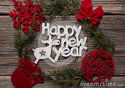 Festive inscription Happy New Year. Composition on a wooden background. Stock Photo