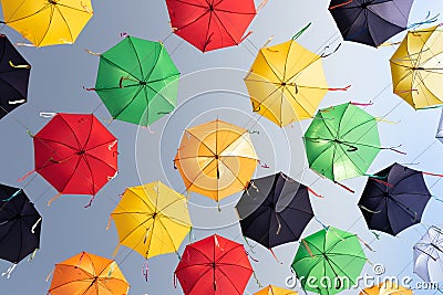 Festive installation - alley of umbrellas on the street of the city Stock Photo