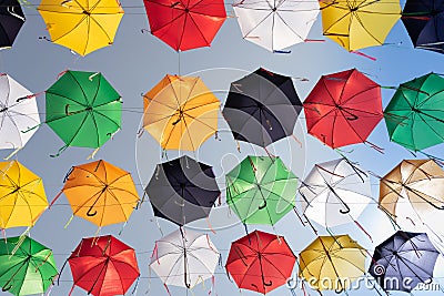 Festive installation - alley of umbrellas on the street of the city Stock Photo