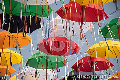 Festive installation - alley of umbrellas on the street of the city Stock Photo