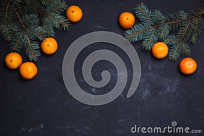 Festive new year composition with tangerines pine cones christmas tree Stock Photo