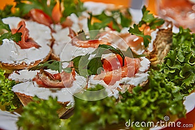 Festive New Year's Table Setting with Cheese Baskets, Fresh Salmon, and Greens Stock Photo