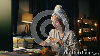 Festive person dancing home closeup. Excited woman enjoying computer evening Stock Photo