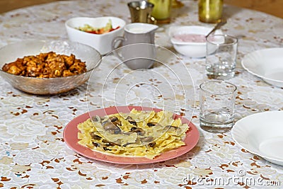 Festively laid Shabbat table with delicious dishes. Stock Photo