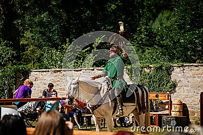 Festivities of Pernstejn Manor, medieval fair, falconer performance, bird of prey, man in historical costume, Reconstruction, Editorial Stock Photo