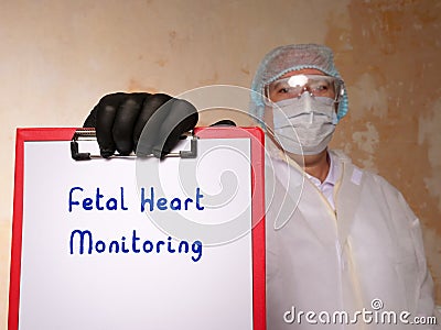 Fetal Heart Monitoring sign on the piece of paper Stock Photo