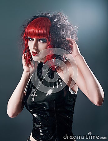 Fetish gothic woman in studio Stock Photo