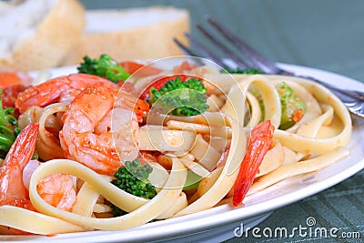 Fettuccine Pasta with Shrimp and Vegetables Stock Photo