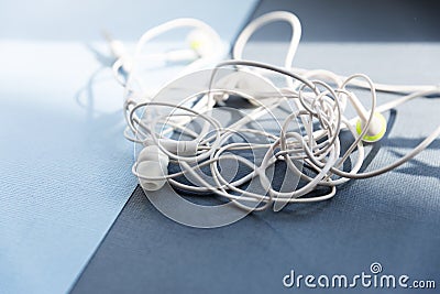 A few confusing drop-shaped headphones Stock Photo