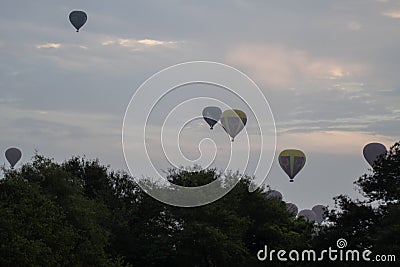 A few hot air balloons in the sky during sunrise in Bagan, Nyaung-U, Myanmar Editorial Stock Photo