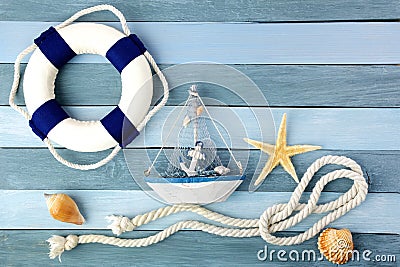 Few summer marine items on a wooden background. Stock Photo
